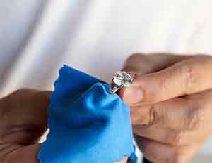 ring cleaning with blue cloth