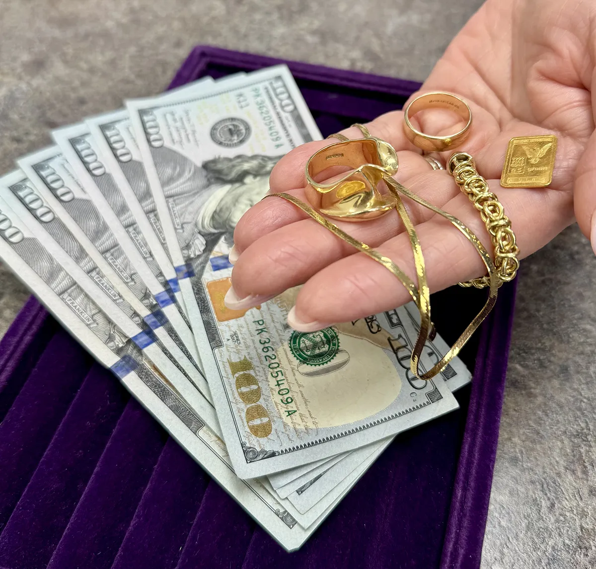 Expert giving cash for gold jewelry