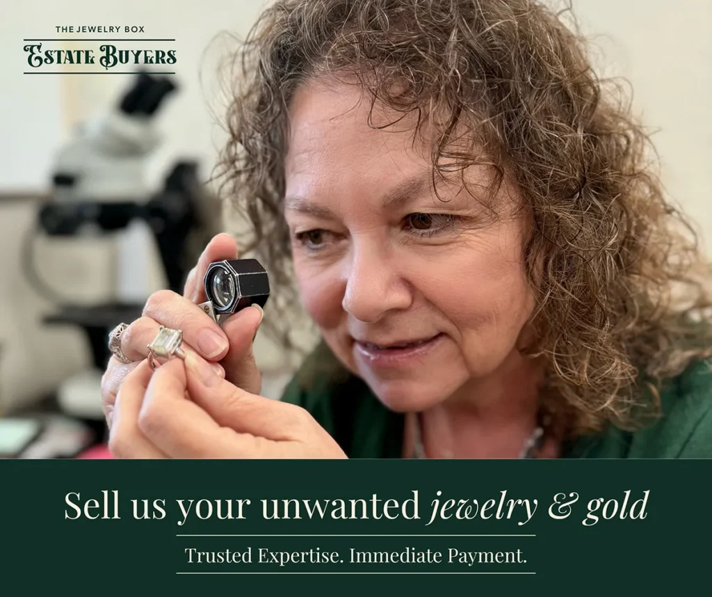 Sell us your unwanted jewelry sign with woman inspecting ring.